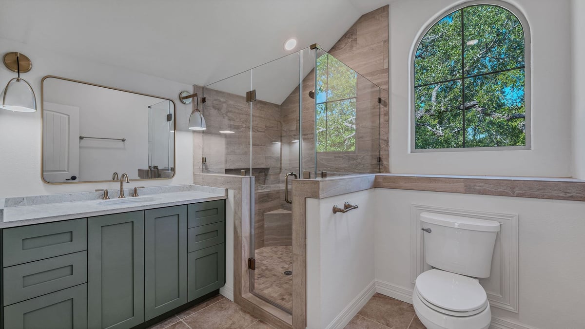 Bathroom Remodel with Green Vanity and Tiled Stand up Shower in San Antonio