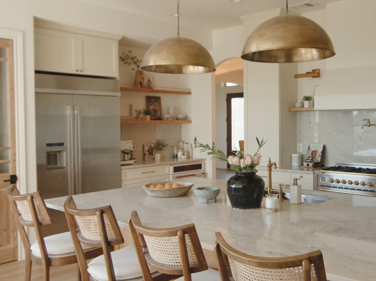 Kitchen In San Antonio with Pendant Lights Over Island