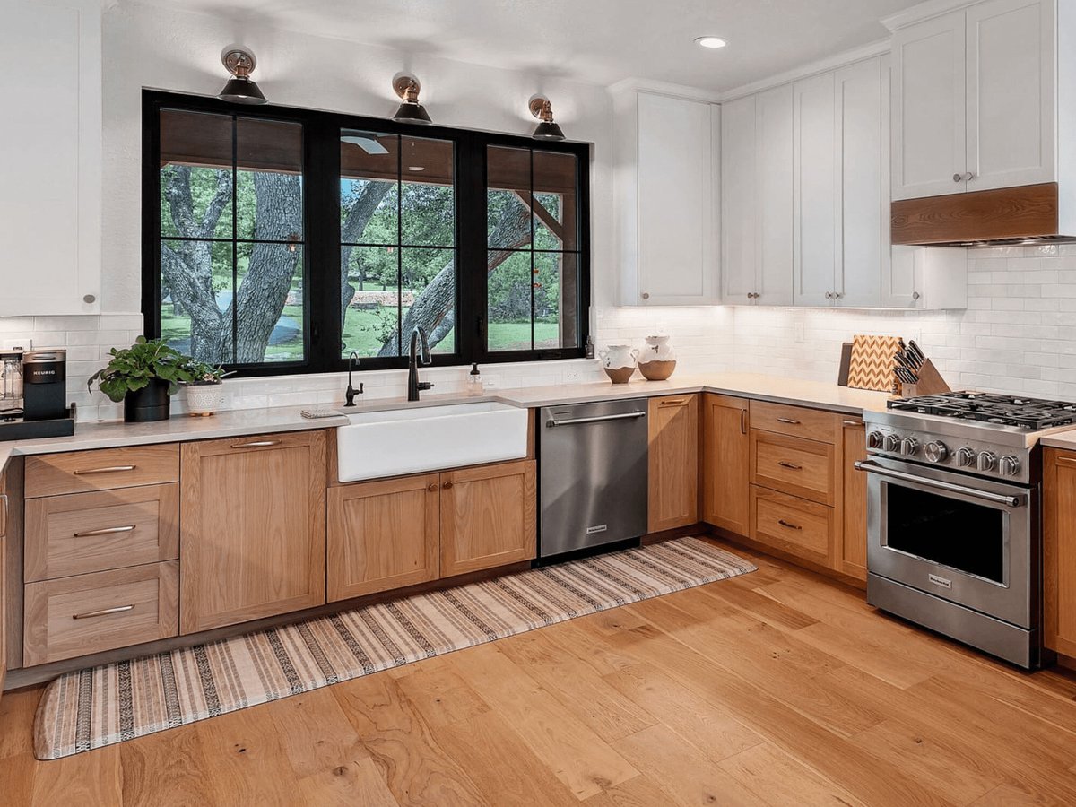 Kitchen Renovation in San Antonio with Wood Cabinets and Floor