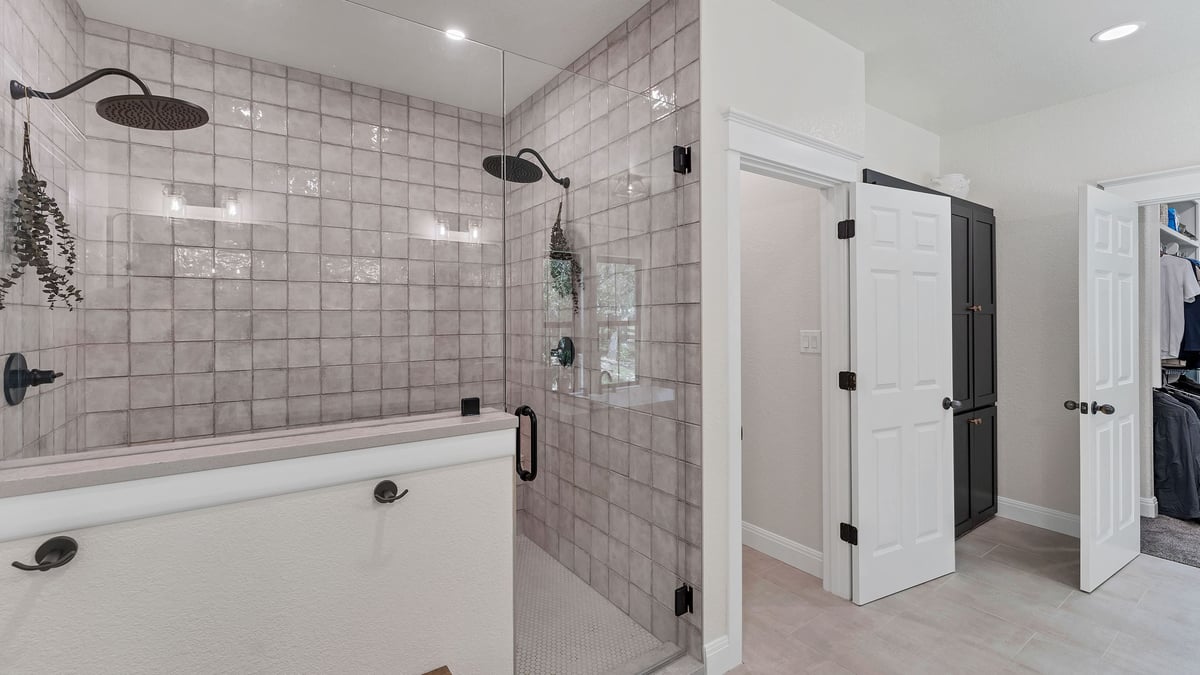 Large Bathroom with Level Entry Shower and Square Tiles